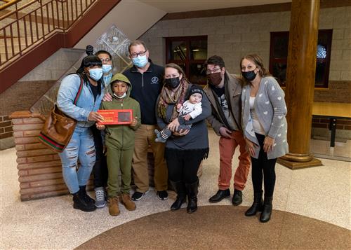 Photo of Stairclimber Davarie Feliciano and family.