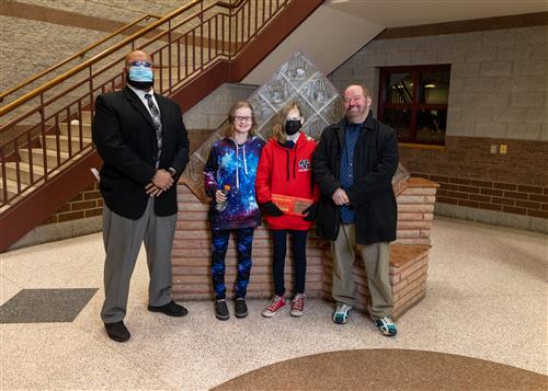 Photo of Stairclimber Isabella Dickey and family.