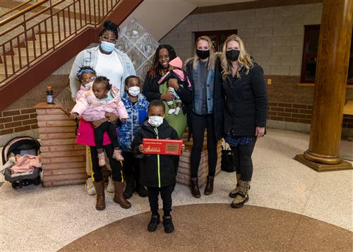 Photo of Grover Cleveland Stairclimber Semaj Gillespie and his family. 