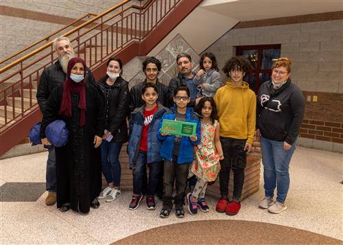 Photo of Jefferson's March Stairclimber, Hasan Alaliwi, and family members.