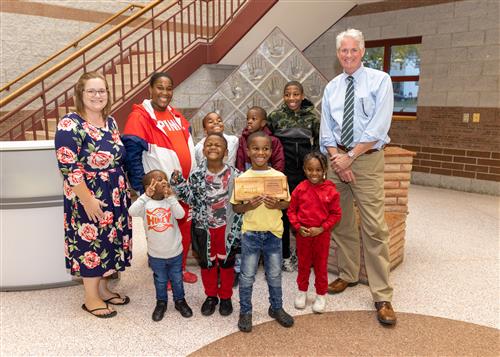 Ri'Marieon Wells-Walker, Diehl's October 2022 Stairclimber, with family and school staff.