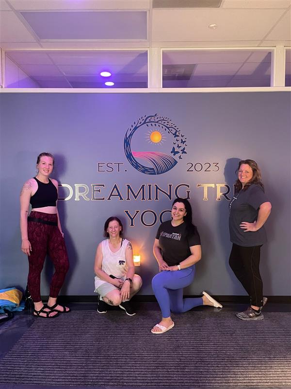 EPS Staff participate in a custom yoga class from Dreaming Tree Yoga